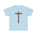 Light blue t-shirt with a graphic of a crucifixion on a white background